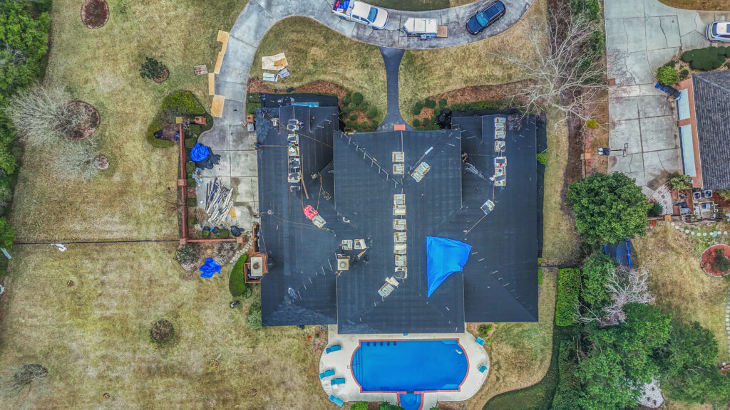 Coastal Edge Roofing doing a roof replacement on a home in Jacksonville Florida.