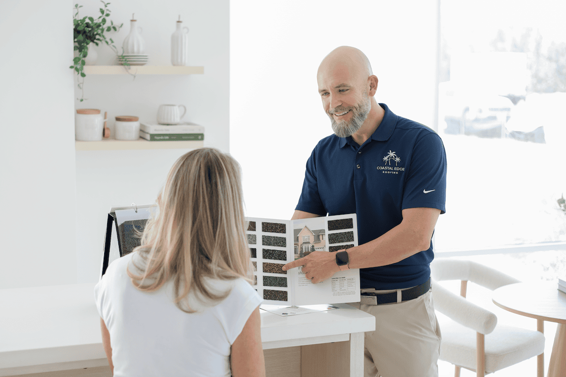 Jacksonville Florida roofing company showing homeowner the different GAF shingle colors available.